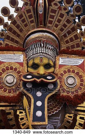 Close-up of a Theyyam dancer, Kerala, India View Large Photo Image Stock Photo - Close-up of a Theyyam dancer, Kerala, India. Fotosearch