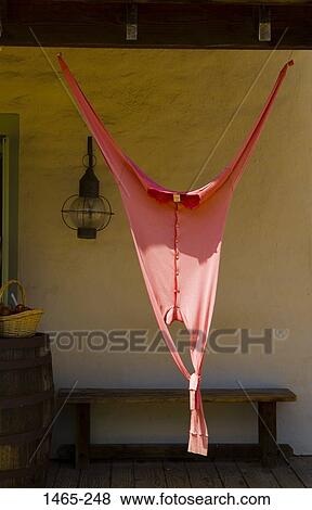 Close-up of long johns hanging in a doorway View Large Photo Image Stock Photo - Close-up of long johns hanging in a doorway. Fotosearch