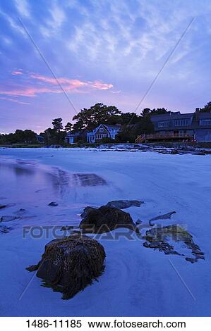 Stock Photography - Cloud over a snow covered beach, New Castle Island, Portsmouth, New Hampshire, USA. Fotosearch