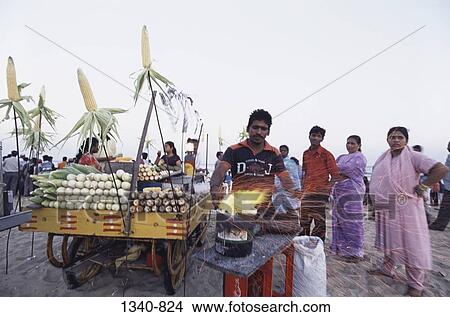 Corn seller on the beach, Marina beach, Chennai, Tamil Nadu, India View Large Photo Image Picture - Corn seller on the beach, Marina beach, Chennai, Tamil Nadu, India. Fotosearch