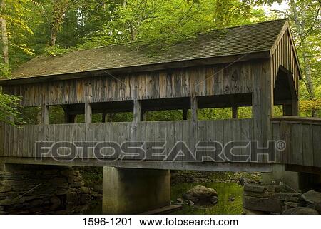 Stock Image - Covered bridge across a river, Devils Hopyard State Park, East Haddam, Connecticut, USA. Fotosearch