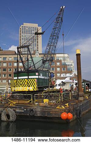 Picture - Crane at a construction site, Rowe's Wharf, Boston Harbor, Boston, Massachusetts, USA. Fotosearch