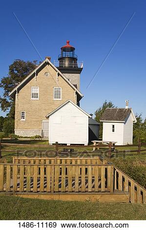 Fence in front of a lighthouse, Thirty Mile Lighthouse, Golden Hill State Park, Lake Ontario, New York State, USA View Large Photo Image Stock Photo - Fence in front of a lighthouse, Thirty Mile Lighthouse, Golden Hill State Park, Lake Ontario, New York State, USA. Fotosearch