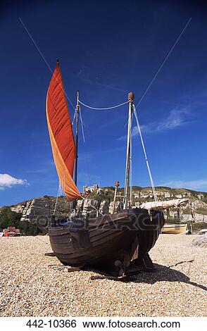 Fishing boat on the beach, Hastings Old Town, Hastings, Sussex, England View Large Photo Image Stock Photograph - Fishing boat on the beach, Hastings Old Town, Hastings, Sussex, England. Fotosearch