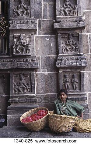 Girl selling flowers at a temple, Chidambaram Temple, Chidambaram, Tamil Nadu, India View Large Photo Image Stock Photography - Girl selling flowers at a temple, Chidambaram Temple, Chidambaram, Tamil Nadu, India. Fotosearch