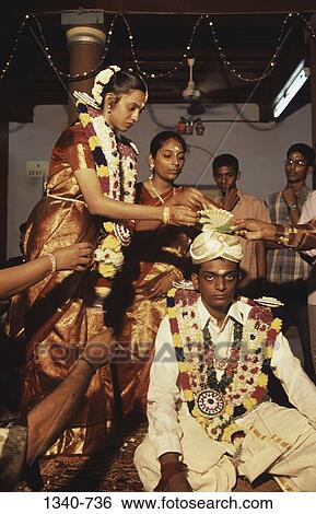 Group of people in a wedding ceremony, Chettinad, Tamil Nadu, India View Large Photo Image Stock Photograph - Group of people in a wedding ceremony, Chettinad, Tamil Nadu, India. Fotosearch