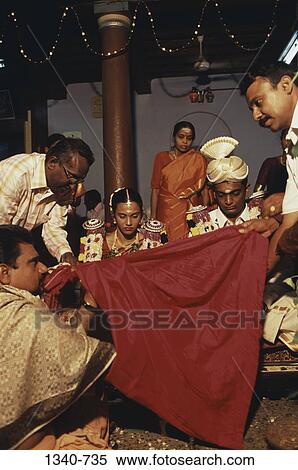 Group of people in a wedding ceremony, Chettinad, Tamil Nadu, India View Large Photo Image Stock Photography - Group of people in a wedding ceremony, Chettinad, Tamil Nadu, India. Fotosearch