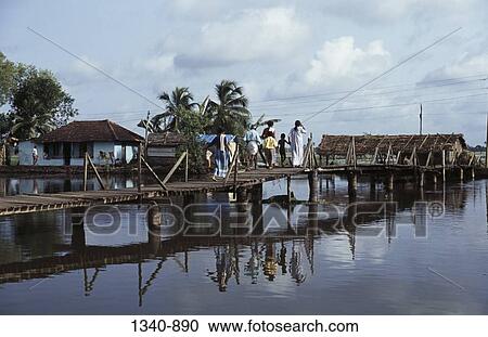 Group of people walking on a pier, Kerala, India View Large Photo Image Stock Image - Group of people walking on a pier, Kerala, India. Fotosearch