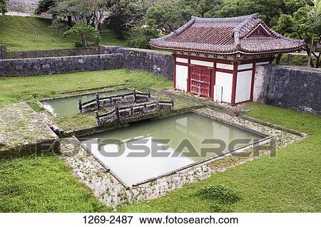 High angle view of a bridge in front of a temple, Enkakuji Temple, Shuri Castle Park, Naha, Okinawa Prefecture, Japan View Large Photo Image Stock Photo - High angle view of a bridge in front of a temple, Enkakuji Temple, Shuri Castle Park, Naha, Okinawa Prefecture, Japan. Fotosearch