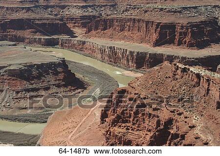 Stock Image - High angle view of a river passing through rock formations, Colorado River, Canyonlands National Park, Utah, USA. Fotosearch
