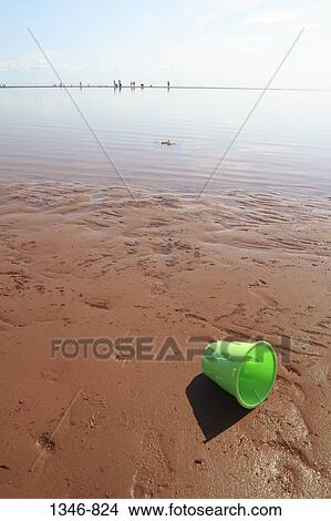 High angle view of a sandcastle mold on the beach, Northumberland Strait, Canoe Cove, Prince Edward Island, Canada View Large Photo Image Picture - High angle view of a sandcastle mold on the beach, Northumberland Strait, Canoe Cove, Prince Edward Island, Canada. Fotosearch