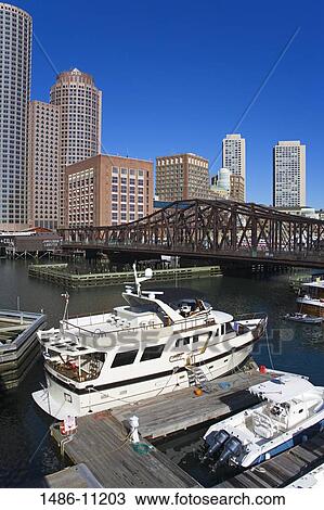 High angle view of boats moored at a dock, Fort Point Channel, Boston, Massachusetts, USA View Large Photo Image Stock Image - High angle view of boats moored at a dock, Fort Point Channel, Boston, Massachusetts, USA. Fotosearch