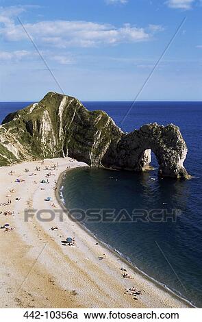 High angle view of rock formations on the beach, Durdle Door, Dorset, England View Large Photo Image Stock Image - High angle view of rock formations on the beach, Durdle Door, Dorset, England. Fotosearch