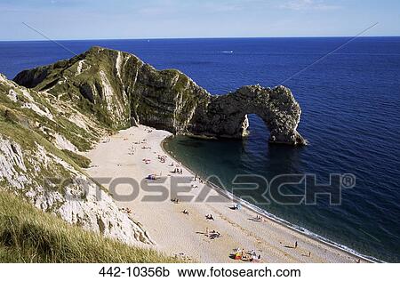 Stock Image - High angle view of rock formations on the beach, Durdle Door, Dorset, England. Fotosearch