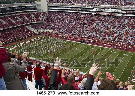 High angle view of spectators cheering at a football stadium View Large Photo Image Stock Image - High angle view of spectators cheering at a football stadium. Fotosearch