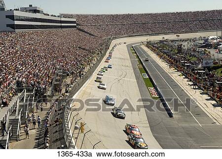 High angle view of stock cars moving on a race track, Dover International Speedway, Dover, Delaware, USA View Large Photo Image Stock Image - High angle view of stock cars moving on a race track, Dover International Speedway, Dover, Delaware, USA. Fotosearch