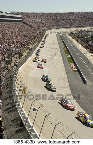 High angle view of stock cars moving on a race track, Dover International Speedway, Dover, Delaware, USA View Large Photo Image Stock Image - High angle view of stock cars moving on a race track, Dover International Speedway, Dover, Delaware, USA. Fotosearch