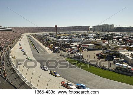 High angle view of stock cars moving on a race track, Dover International Speedway, Dover, Delaware, USA View Large Photo Image Stock Image - High angle view of stock cars moving on a race track, Dover International Speedway, Dover, Delaware, USA. Fotosearch