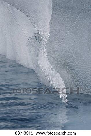 Stock Photography - Iceberg in the sea. Fotosearch
