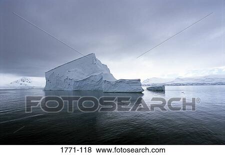 Icebergs floating in the sea, Antarctica View Large Photo Image Stock Photo - Icebergs floating in the sea, Antarctica. Fotosearch