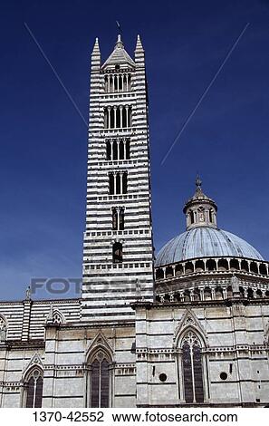 Low angle view of a cathedral's dome and bell tower, Duomo di Siena, Siena, Tuscany, Italy View Large Photo Image Stock Image - Low angle view of a cathedral's dome and bell tower, Duomo di Siena, Siena, Tuscany, Italy. Fotosearch