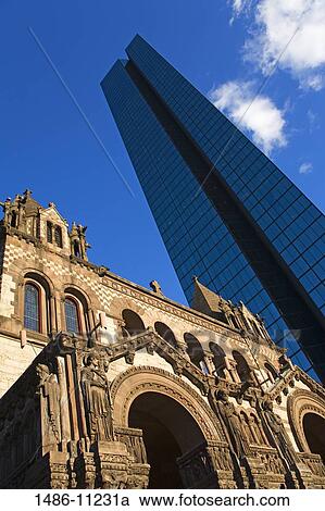 Low angle view of a church near a tower, Trinity Church, John Hancock Tower, Copley Square, Boston, Massachusetts, USA View Large Photo Image Stock Image - Low angle view of a church near a tower, Trinity Church, John Hancock Tower, Copley Square, Boston, Massachusetts, USA. Fotosearch