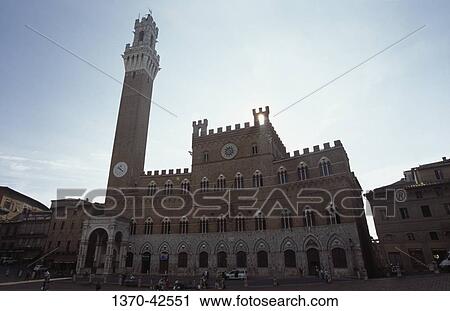 Low angle view of a government building, Palazzo Pubblico, Torre del Mangia, Piazza del Campo, Siena, Tuscany, Italy View Large Photo Image Stock Image - Low angle view of a government building, Palazzo Pubblico, Torre del Mangia, Piazza del Campo, Siena, Tuscany, Italy. Fotosearch