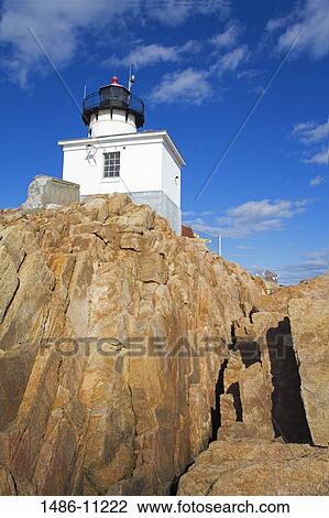 Stock Image - Low angle view of a lighthouse, Eastern Point Lighthouse, Gloucester, Cape Ann, Massachusetts, USA. Fotosearch