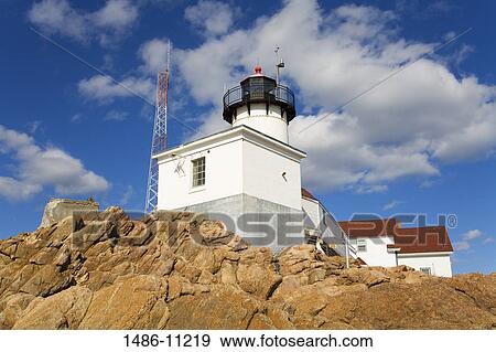 Low angle view of a lighthouse, Eastern Point Lighthouse, Gloucester, Cape Ann, Massachusetts, USA View Large Photo Image Stock Photo - Low angle view of a lighthouse, Eastern Point Lighthouse, Gloucester, Cape Ann, Massachusetts, USA. Fotosearch