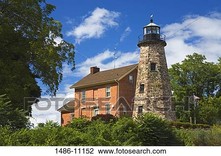 Stock Image - Low angle view of a lighthouse, Charlotte-Genesee Lighthouse Museum, Rochester, New York State, USA. Fotosearch