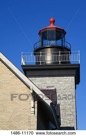 Low angle view of a lighthouse, Thirty Mile Lighthouse, Golden Hill State Park, Lake Ontario, New York State, USA View Large Photo Image Stock Image - Low angle view of a lighthouse, Thirty Mile Lighthouse, Golden Hill State Park, Lake Ontario, New York State, USA. Fotosearch