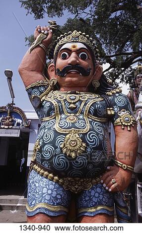 Low angle view of a statue, Ayyanar Temple, Kochadai, Madurai, Tamil Nadu, India View Large Photo Image Stock Image - Low angle view of a statue, Ayyanar Temple, Kochadai, Madurai, Tamil Nadu, India. Fotosearch