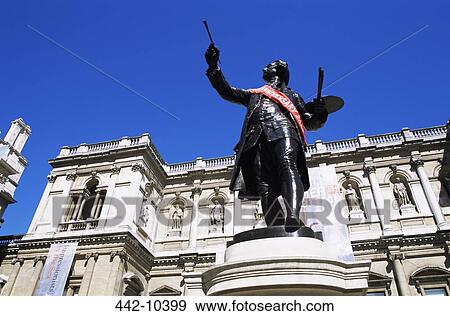Stock Photo - Low angle view of a statue, Sir Joshua Reynolds by Alfred Drury, Royal Academy of Arts, Piccadilly, London, England. Fotosearch