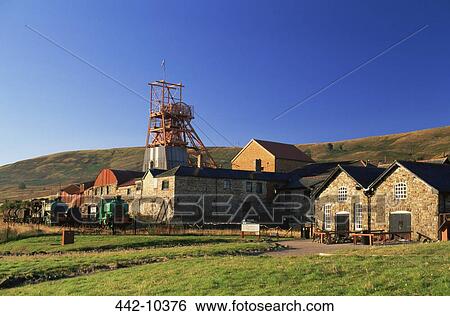 Stock Photograph - Low angle view of an old pit mining structure, Big Pit National Coal Museum, Blaenavon, Monmouthshire, Wales. Fotosearch