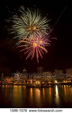 Low angle view of fireworks display in the sky at night, Cinco de Mayo Fiesta, Eastside Esplanade, Portland, Oregon, USA View Large Photo Image Stock Photo - Low angle view of fireworks display in the sky at night, Cinco de Mayo Fiesta, Eastside Esplanade, Portland, Oregon, USA. Fotosearch