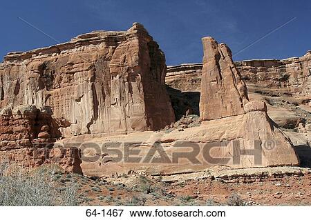 Low angle view of rock formations on a landscape, Arches National Park, Utah, USA View Large Photo Image Stock Photo - Low angle view of rock formations on a landscape, Arches National Park, Utah, USA. Fotosearch
