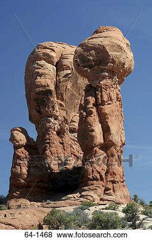 Low angle view of rock formations, Rock Hoodoo, Arches National Park, Utah, USA View Large Photo Image Stock Photo - Low angle view of rock formations, Rock Hoodoo, Arches National Park, Utah, USA. Fotosearch