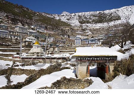 Low angle view of snow covered houses, Namche Bazar, Sagarmatha National Park, Nepal View Large Photo Image Stock Photo - Low angle view of snow covered houses, Namche Bazar, Sagarmatha National Park, Nepal. Fotosearch