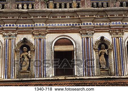 Stock Photo - Low angle view of statues on the both sides of the window of a house, Chettinad, Sivaganga, Tamil Nadu, India. Fotosearch