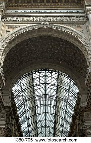 Low angle view of the entrance of a building, Galleria Vittorio Emanuele II, Milan, Lombardy, Italy View Large Photo Image Stock Photography - Low angle view of the entrance of a building, Galleria Vittorio Emanuele II, Milan, Lombardy, Italy. Fotosearch