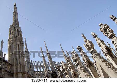 Low angle view of towers of a church, Duomo, Milan, Lombardy, Italy View Large Photo Image Stock Image - Low angle view of towers of a church, Duomo, Milan, Lombardy, Italy. Fotosearch