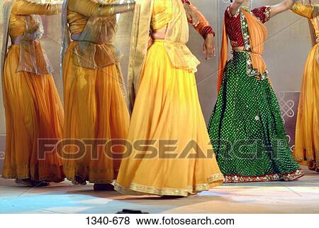 Low section view of a group of women performing Kathak, a classical dance of India, India View Large Photo Image Stock Photo - Low section view of a group of women performing Kathak, a classical dance of India, India. Fotosearch