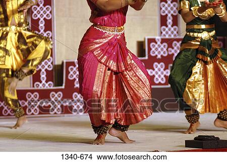 Low section view of two women performing Bharatnatyam, a classical dance of India, India View Large Photo Image Picture - Low section view of two women performing Bharatnatyam, a classical dance of India, India. Fotosearch