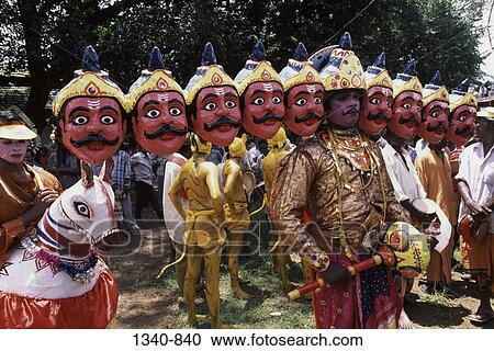 Man dressed as the Ravana a ten headed king of demons in Hindu Mythology in a traditional festival, Thrippunithura, Cochin, Kerala, India View Large Photo Image Stock Image - Man dressed as the Ravana a ten headed king of demons in Hindu Mythology in a traditional festival, Thrippunithura, Cochin, Kerala, India. Fotosearch