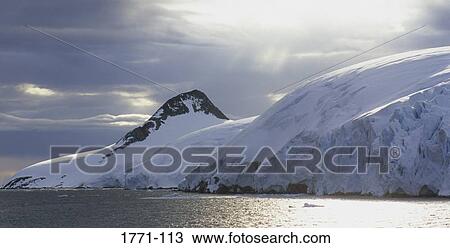 Mountain covered with snow at the seaside, Paradise Bay, Antarctic Peninsula, Antarctica View Large Photo Image Stock Image - Mountain covered with snow at the seaside, Paradise Bay, Antarctic Peninsula, Antarctica. Fotosearch