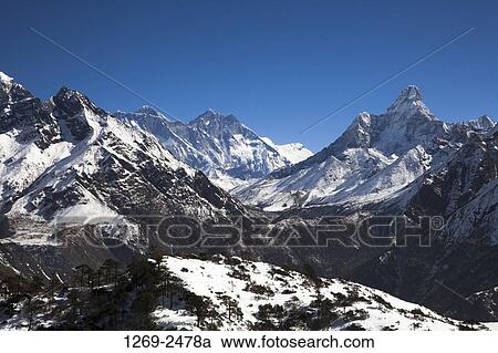 Mountain range covered with snow, Sagarmatha National Park, Nepal View Large Photo Image Stock Image - Mountain range covered with snow, Sagarmatha National Park, Nepal. Fotosearch