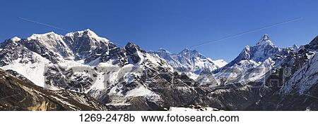 Mountain range covered with snow, Sagarmatha National Park, Nepal View Large Photo Image Stock Image - Mountain range covered with snow, Sagarmatha National Park, Nepal. Fotosearch