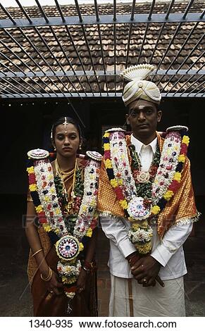 Newlywed couple standing together, Chettinad, Tamil Nadu, India View Large Photo Image Stock Photography - Newlywed couple standing together, Chettinad, Tamil Nadu, India. Fotosearch