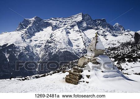 Stock Image - Pagoda in a mountain range, Kongde Ri, Sagarmatha National Park, Nepal. Fotosearch