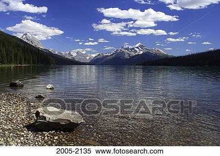 Panoramic view of a lake, Maligne Lake, Jasper National Park, Alberta, Canada View Large Photo Image Stock Photography - Panoramic view of a lake, Maligne Lake, Jasper National Park, Alberta, Canada. Fotosearch